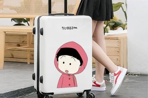 <b>拉杆< b>箱上<b>的< b>旅行包.